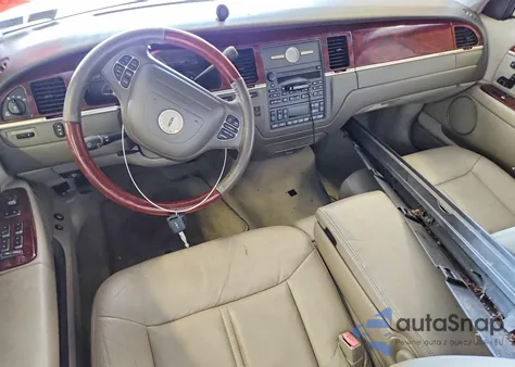 2003 Lincoln Town Car Cartier L z USA, uszkodzony, nr VIN 1LNHM85W93Y682395